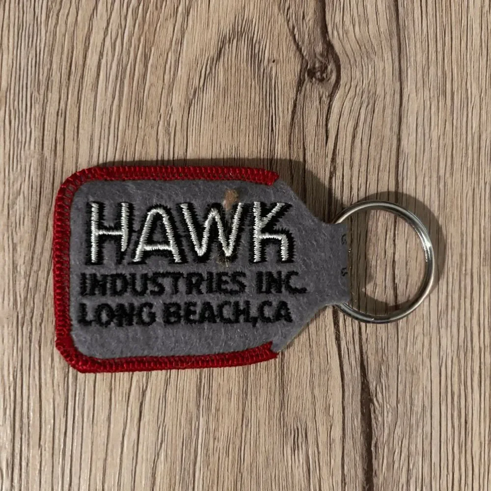 Vintage business logo keychain hawk industries long beach red gray black